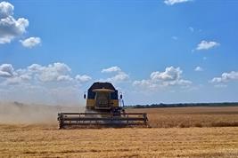 Combine harvester in a Ukrainian wheat field